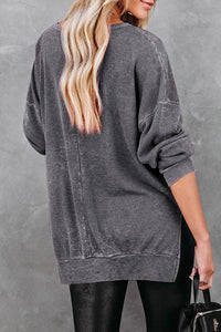 back view of the grey side slit sweatshirt